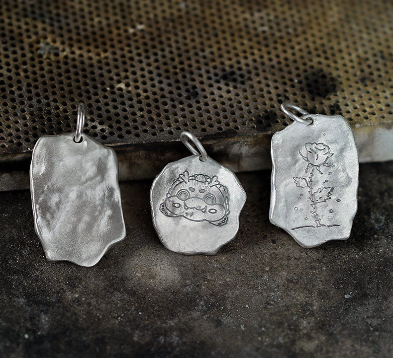 The Whisper Mark Pendant